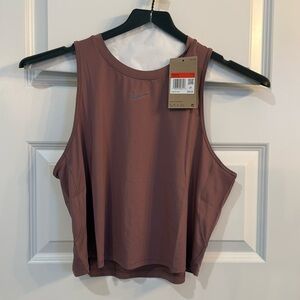 Women’s Nike crop workout shirt. Brand new, size L. Tags still on.